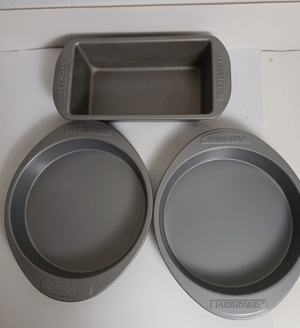 3 Piece Set Farberware 9" Cake Pans (2) 8" Loaf Pan (1) Silver