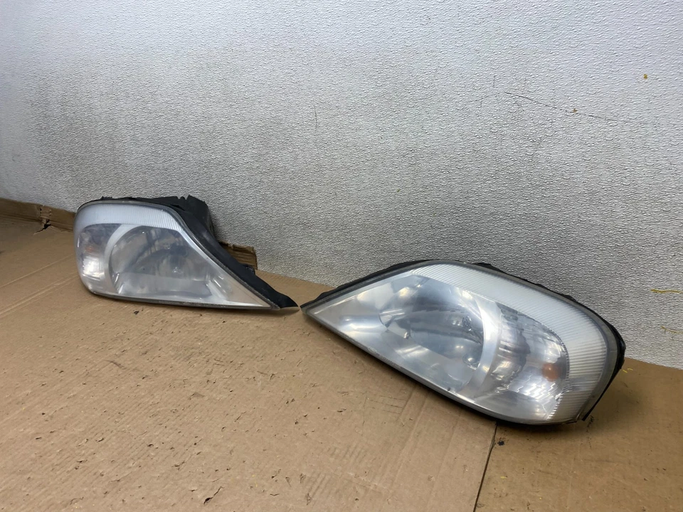 Juego de faros halógenos laterales izquierdo+derecho Mercury Sable 2000 a 2005 U8611 DW Foto 2 de 4