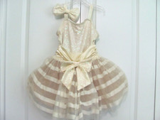 PRE-OWNED CHILD LARGE DANCEWEAR BEIGE  GOLD DRESS W/ HAIR BOW CLIP