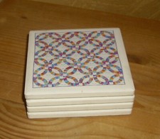 4  hübsche Untersetzer, Steinzeug, Mehrfarbiges Muster