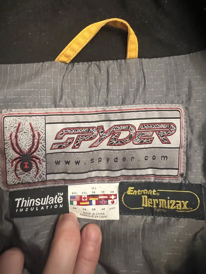 Chaqueta de esquí Spyder para hombre grande amarilla negra Dermizax-EV X-Static aislada Snow2XL Foto 2 de 4