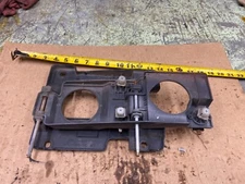 1996-1999 GMC EX. CAB   LEFT HEADLIGHT BRACKET