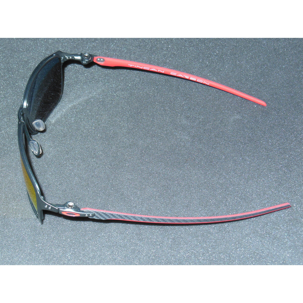 2ND* Oakley Tincan Carbon Ferrari Sunglasses Carbon/Ruby 2ND* Oakley Tincan Carbon Ferrari Sunglasses Carbon/Ruby