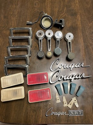 1969-1970 Mercury Cougar Assorted Misc Parts Lenses Bezels Window Cranks Emblems