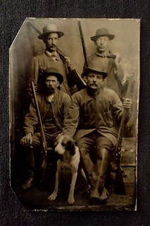 CIRCA 1860 1900 ANTIQUE TINTYPE GROUP OF HUNTERS WITH RIFLES HATS BOOTS & DOG