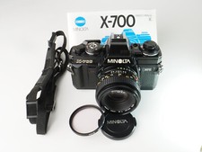 GOOD, TESTED Minolta X-700 w/MD 50mm F/2 manual lens cap Sky1B strap batteries
