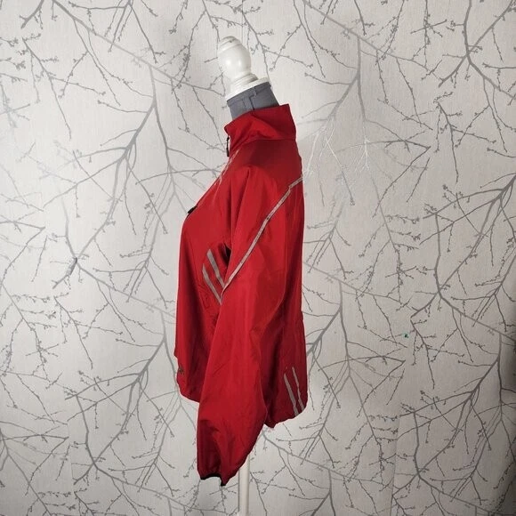 Chaqueta cortavientos Sugoi roja reflectante tira cremallera completa | Para mujer M Foto 3 de 4