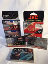SET OF 6 VARIOUS CASSETTE TAPES AND ONE TDK DRY AUDIO HEAD CLEANER, ALL SEALED