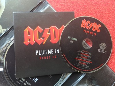 AC/DC Plug Me In, DVD Box Set, 3 Discs 2 Live DVD, 1 CD 2 Booklets