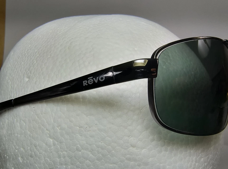 Gafas de sol envolventes rectangulares de metal plateado Revo 3014 080/K3 monturas 61-18 125 Italia Foto 4 de 4