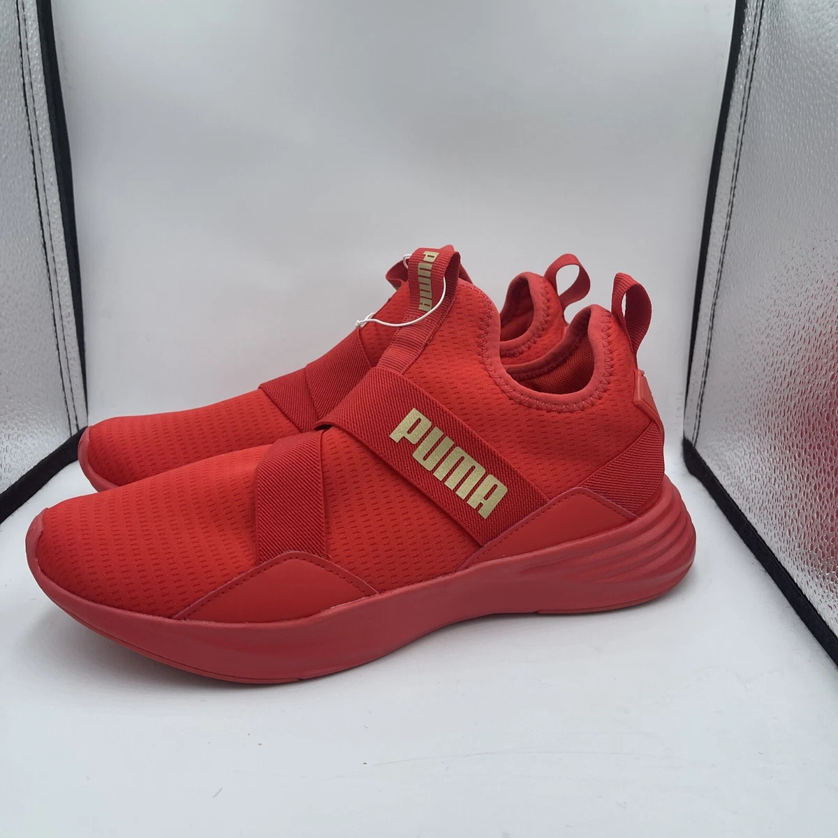 Red and gold puma best sale shoes