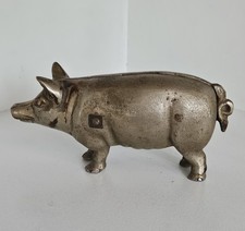 Antigua moneda de cerdo cerdito de hierro fundido enchapada en níquel banco raro