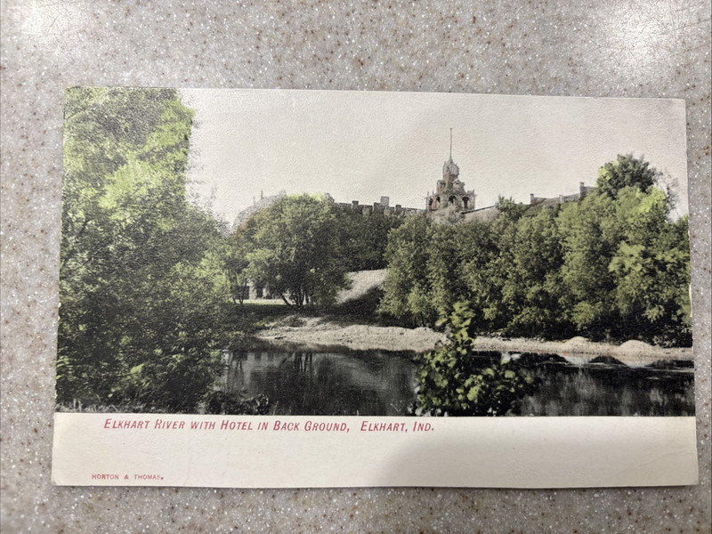 Postcard Elkhart, IN. Elkhart River with Hotel in Back Ground. Undivided.