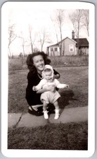 Vintage Snapshot Smiling Woman Holding Baby 1940s