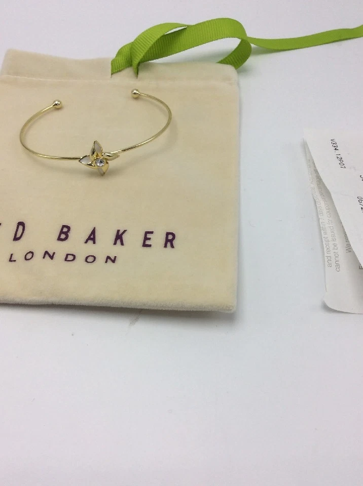 Colgante Ted Baker Brisa Cristal Esmalte Blanco Tono Dorado $45 Foto 4 de 4