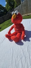 Play All Day Elmo, an interactive 22-inch plush toy released by Playskool/Hasbro