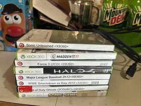 Microsoft Xbox 360 E Black 4GB with 8 games