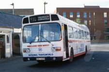 Bus Photo - Midland Red West 545 NOE545R Leyland National Travelworld advert