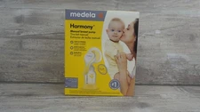 NEW sealed box Medela Manual Breast Pump with Flex Shields Harmony