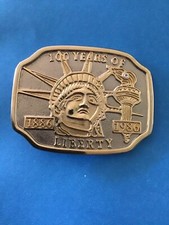 This is a gold tone belt buckle