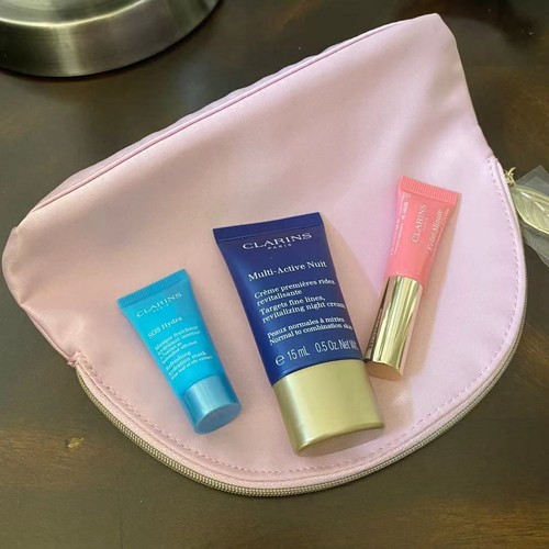 Juego de regalo de Clarins trío Multi-Active Nuit/labios Perfector/SOS Hydra en una bolsa de rosa | eBay