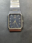 Vintage Seiko 5P31-5049 Analog Men's Watch Blue Face Silver Tone