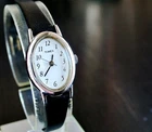 VINTAGE TIMEX ELEGANT OVAL DIAL QUARTZ WOMEN'S SILVER BLACK BAND DRESS WATCH