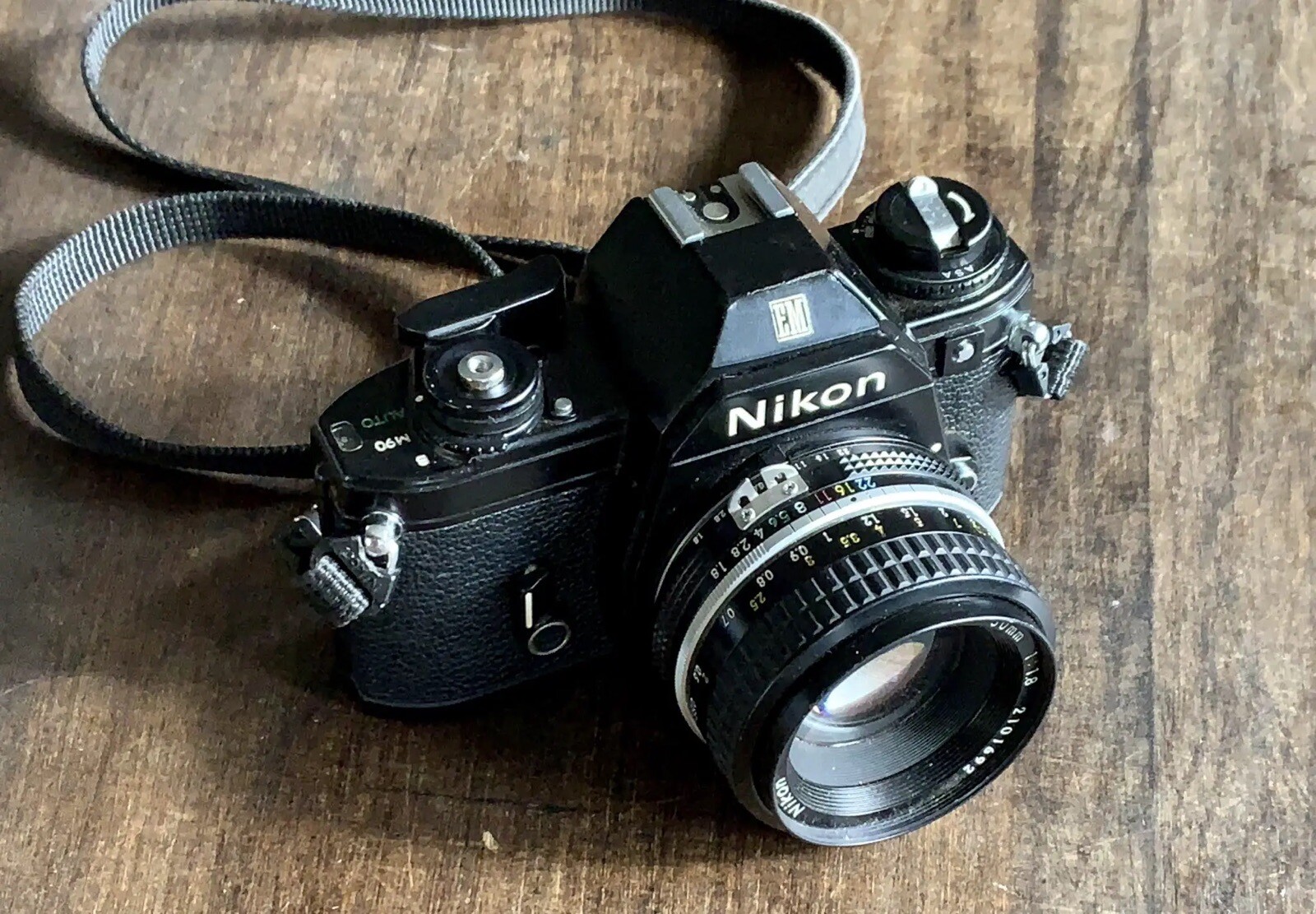 Nikon EM 35MM Film Camera w/50MM 1.8 Nikon Series E Lens & Case Vintage