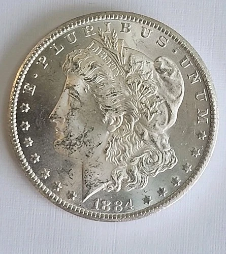 1884 CC CHOICE BU  MORGAN SILVER DOLLAR