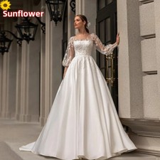 Luxury A-Line Wedding Dresses Scoop Neck Long Sleeved Lace Applique Bridal Gowns