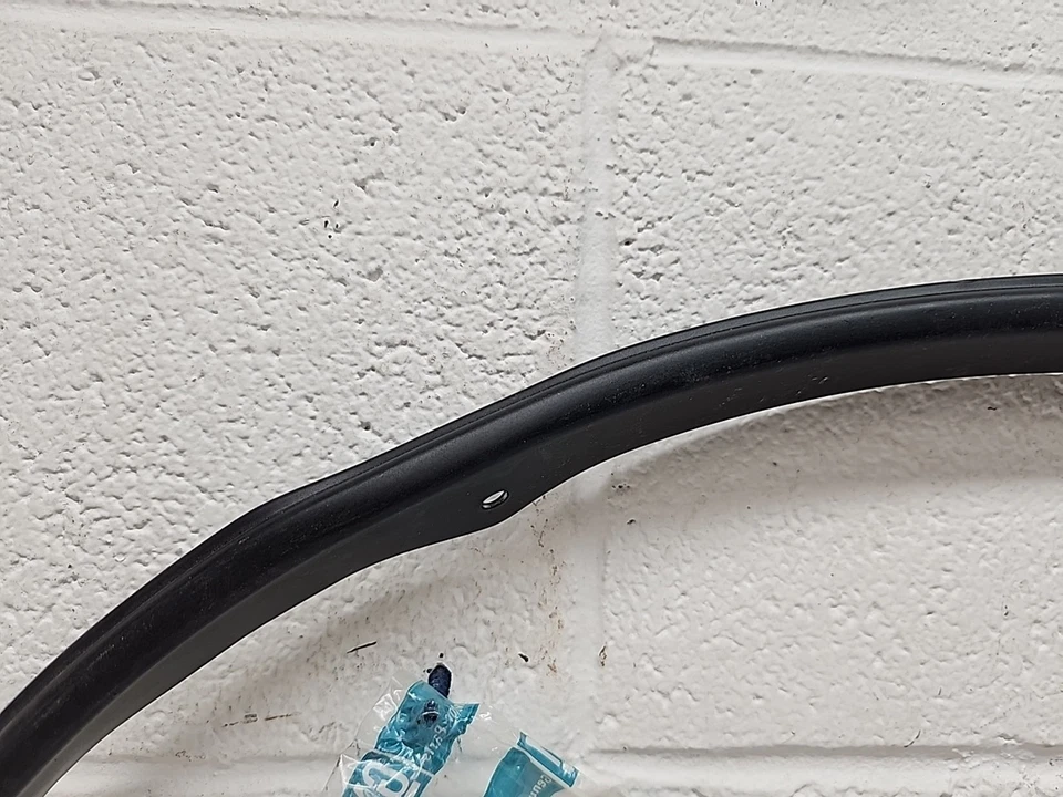 New OEM GM Rear LH Wheel Well Trim 20500892 1985-88 Oldsmobile Calais (SR14) - Image 4 of 4