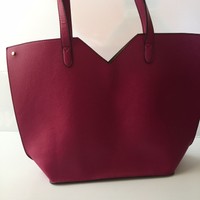 Neiman Marcus Magenta Faux Leather Tote ($95) Neiman Marcus Magenta Faux Leather Tote ($95)