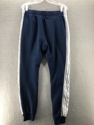 grey adidas joggers with blue stripes