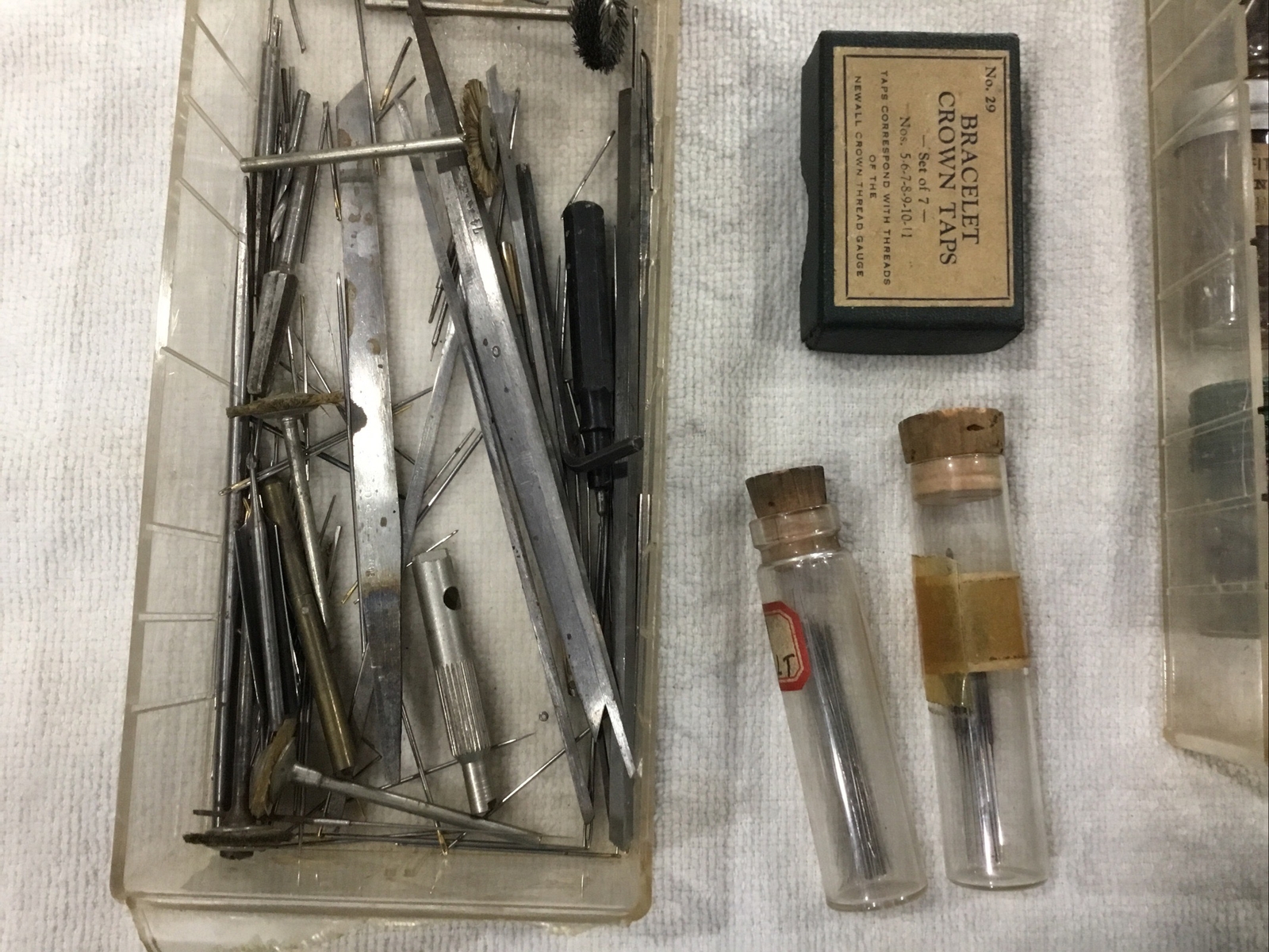 Vintage a lot of pocket watch repair tools and stems and crown Taps