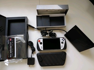 Asus Rog Ally with a 2tb m.2, XG Mobile AMD RX 6850M XT External GPU with boxes