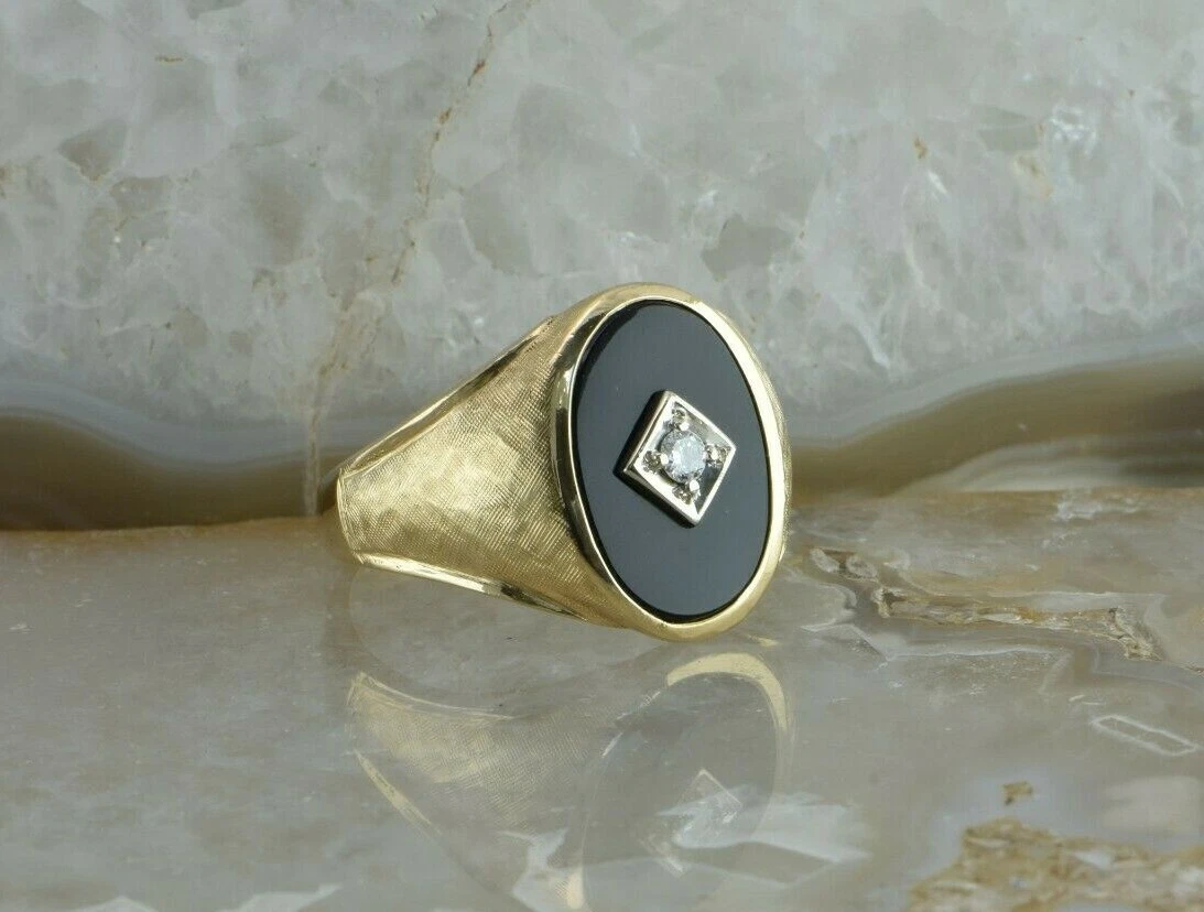 Black onyx ring with outlet diamond in center