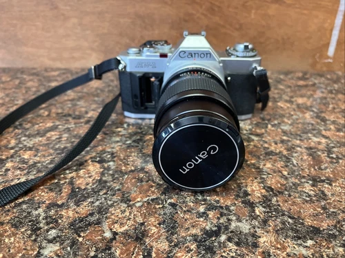 Canon AV-1 SLR 35mm Film Camera w/ Lens 135mm Q21