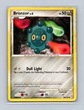 Bronzor 74/123 Common Mysterious Treasures Pokemon Lightly Played