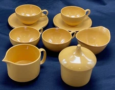 Orange plastic ONEIDA DELUXE tea set - 4 cups/saucers - creamer, sugar bowls
