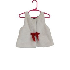 Tommy Bahama girls Faux fur vest with red mid section bow tie