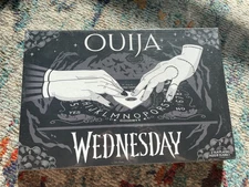 Ouija: Wednesday Edition Glow In The Dark Spirit Board USAOPOLY Addams.