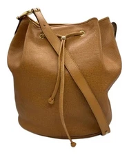 Christian Dior                    Drawstring CD logo shoulder bag beige