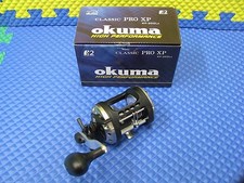 CARRETE DE ARRASTRE OKUMA HP CLASSIC PRO XP LEVELWIND 2 BRGS XP-202La