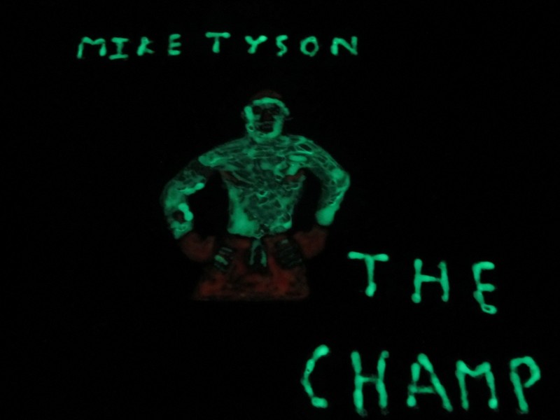 MIKE TYSON.  GLOW IN THE DARK. RARE PRODUCT.  ONE PAIR.  SEE VIDEO.  NEW.