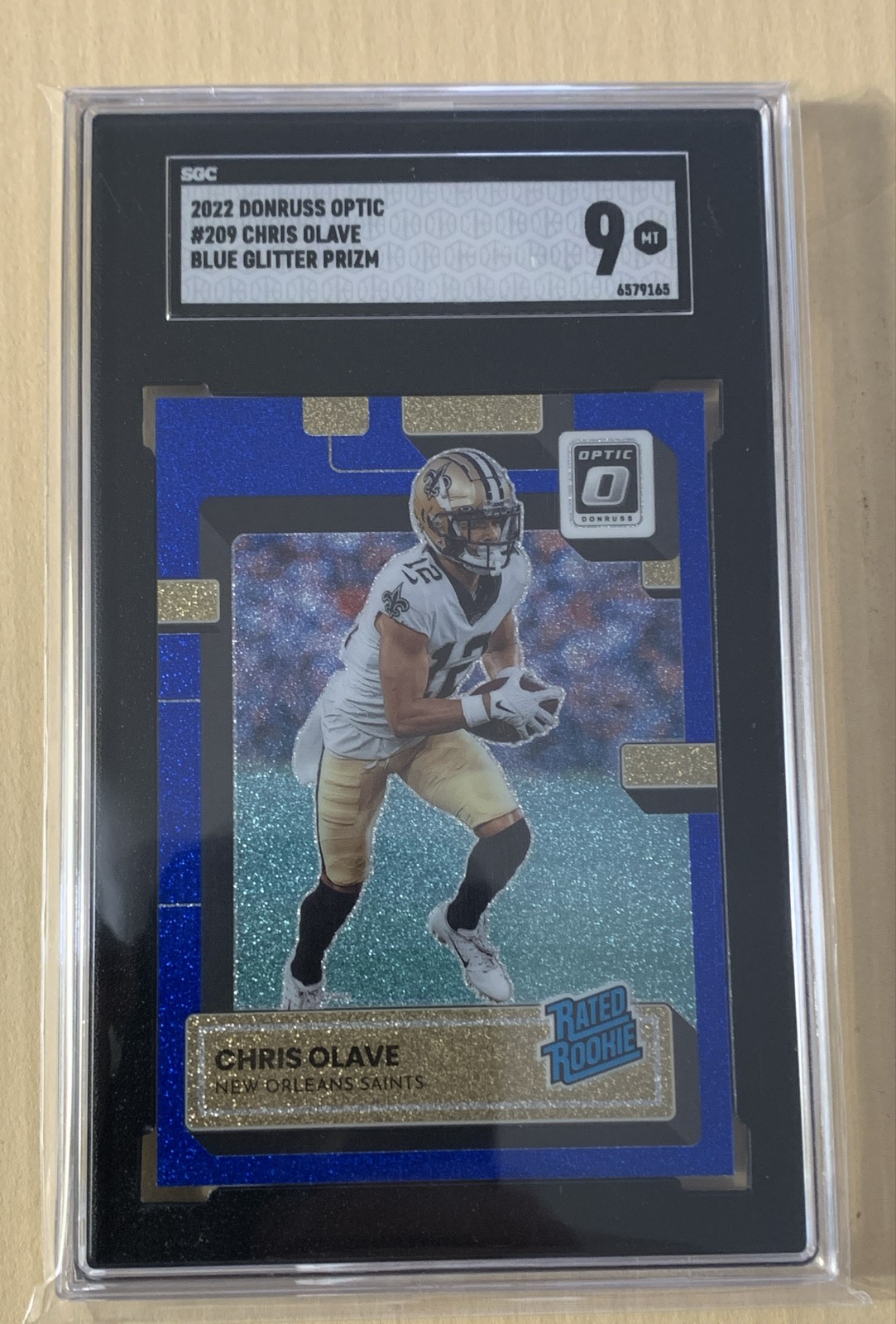 2022 Panini Donruss Optic - Rated Rookie Chris Olave #209 Blue Glitter Prizm...