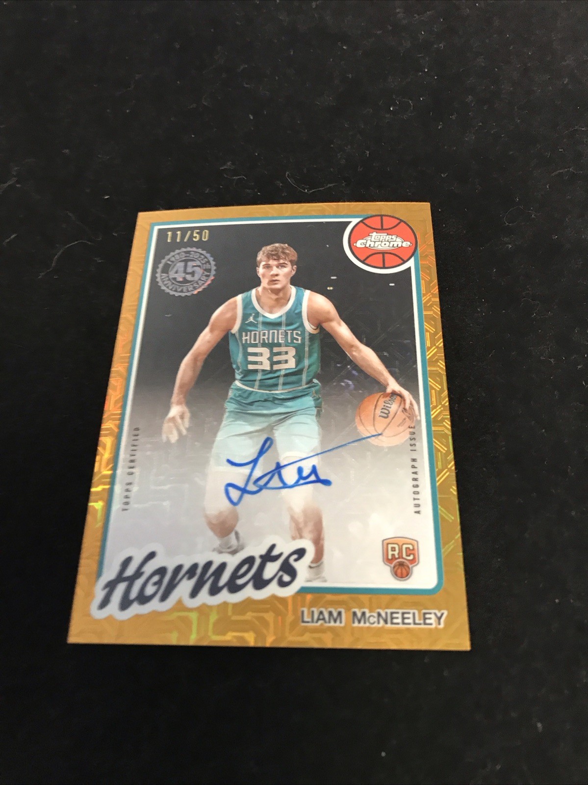 2025-26 Topps Liam McNeeley 1980-81 Chrome Auto RC Gold Mojo Refractor #11/50