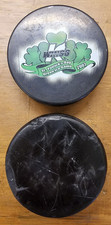 Kalamazoo Wings Hockey Pucks - Happy St. Pats and Black Game Puck - Used 2007