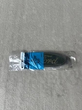 1986 NOS Ford L-Series Front Grille Blue Oval Emblem