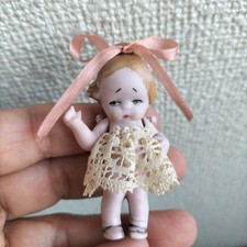 German Antique Hertwig Miniature Bisque Doll Girl 6cm with Ribbon Lace Skirt U