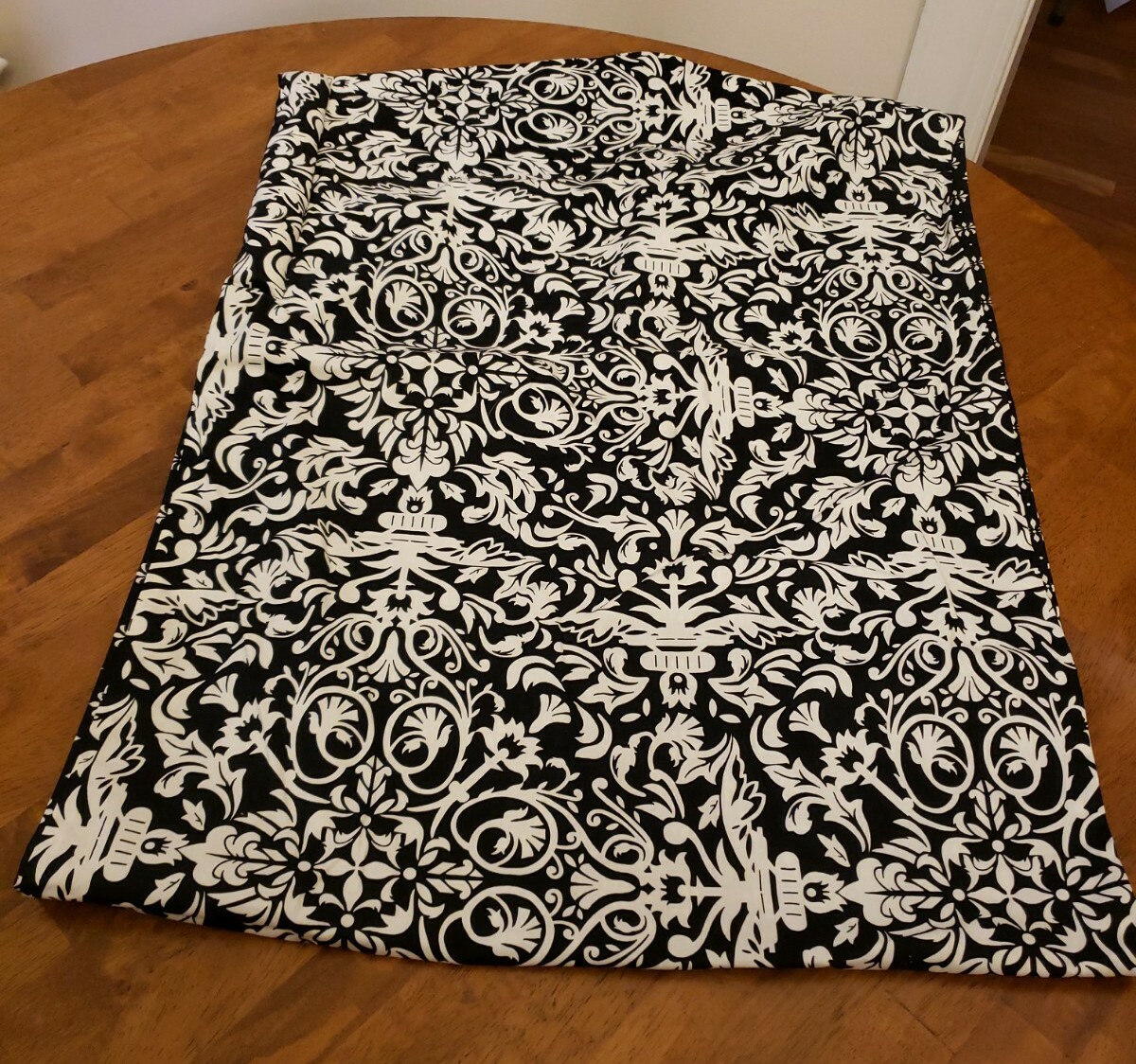 munchkin reversible sling